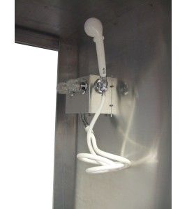 Portable aluminium decontamination shower for asbestos abatement workers (34 x 30 x 83 inches).