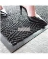 Chevron entrance carpet, 5/16 in made of charcoal gray polypropylene.