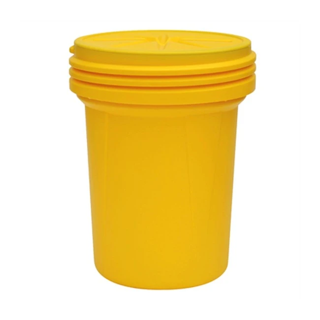 Ensemble pour déversement d’huiles et hydrocarbures, 30 gallons US (114 L), dans un baril refermable.