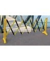 Barrière de sécurité extensible, 11 1/2 pieds (3,5 m), en polypropylène jaune et noir.