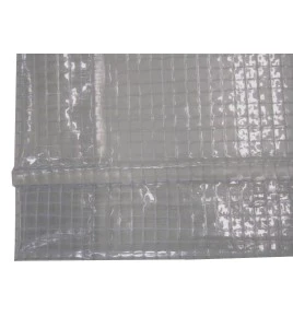 13 mil thick vinyl reinforced with polyester thread installed in a mesh, flame, oil and acid resistant.