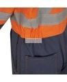 Combinaison de protection Pioneer pour femme en poly/coton 7 oz V2021450 modèle 5514WBB orange/bleue marine vendue à l'unité