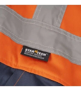 Combinaison de protection Pioneer pour femme en poly/coton 7 oz V2021450 modèle 5514WBB orange/bleue marine vendue à l'unité