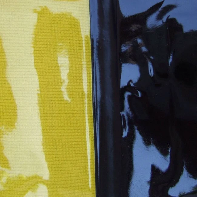 Shade 8 flame-resistant PVC, 14 mils thick, for welding area. Sold by square foot.