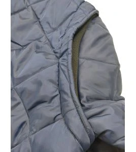 Short blue fleece-lined refrigeration coat with 3 pockets, snap closure.