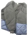 Short blue fleece-lined refrigeration coat with 3 pockets, snap closure.