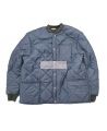 Short blue fleece-lined refrigeration coat with 3 pockets, snap closure.
