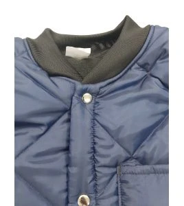 Short blue fleece-lined refrigeration coat with 3 pockets, snap closure.