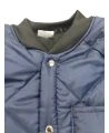 Short blue fleece-lined refrigeration coat with 3 pockets, snap closure.