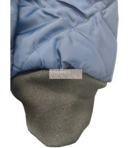 Short blue fleece-lined refrigeration coat with 3 pockets, snap closure.