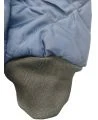 Short blue fleece-lined refrigeration coat with 3 pockets, snap closure.