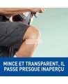 Nexcare MHW-40-CA bandage on a knee, thin and clear